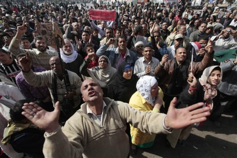 Egyptians shout anti-military ruling council slogans during a protest at Tahrir Square, the focal point of the Egyptian uprising, in Cairo on Friday.